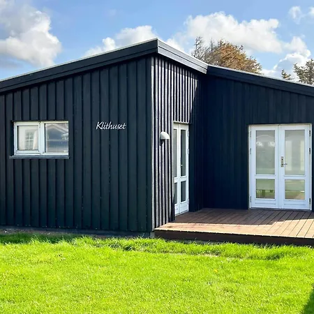 Black Wooden Summer House By The West Coast