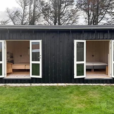 Black Wooden Summer House By The West Coast *